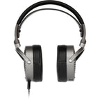 Audeze MM-100 studio headphones with over-ear design, black ear cups, and adjustable headband for professional audio monitoring.