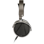 Audeze MM-100 studio headphones with over-ear design and plush ear cups, ideal for professional audio mixing and listening.
