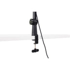 Shure SH-BROADCAST1 broadcast microphone arm mounted on a desk with a microphone attached for professional audio recording.