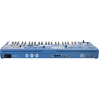 UDO Audio Super 6 synthesizer keyboard with multiple keys and control knobs, designed for music production and sound shaping.