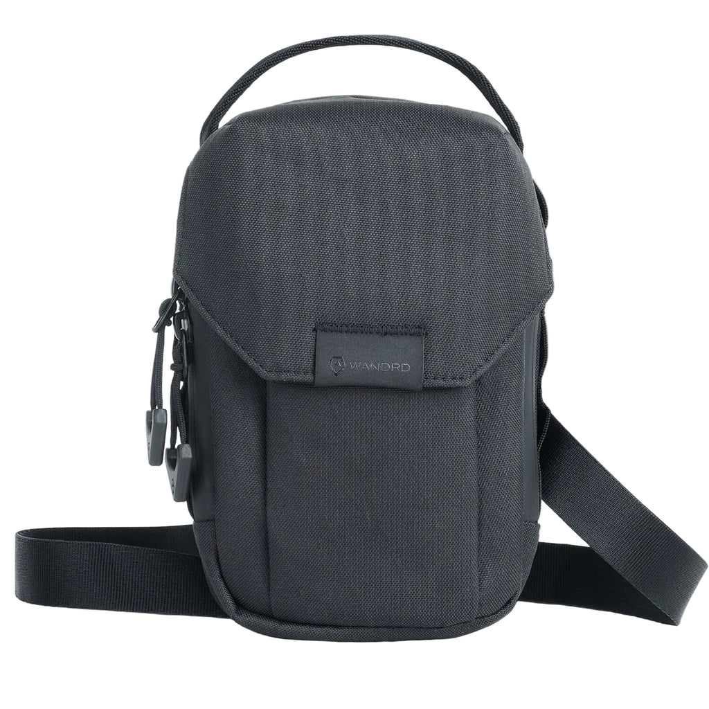 Wandrd X1 Cross Body video equipment bag with adjustable strap and multiple compartments for cameras and accessories.