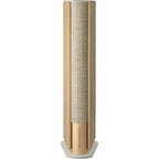 Bang & Olufsen Beosound Emerge wireless speaker in gold tone with sleek design and fabric-covered exterior.