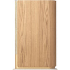 Bang & Olufsen Beosound Emerge wireless speaker in gold tone, showcasing its sleek, modern design and compact form.