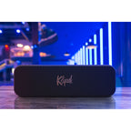Klipsch Detroit portable speakers showcasing sleek design and premium sound quality in a stylish home setting.