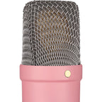 Rode NT1 Signature Series condenser microphone with metal body and shock mount for studio recording and professional audio.