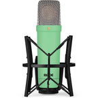 Rode NT1 Signature Series condenser microphone with black finish, shown from a slight angle, capturing studio audio equipment.
