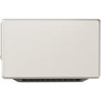 Xgimi Horizon Ultra projector displaying a vibrant image on a wall in a modern living room setting.