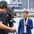 Rode Interview Pro wireless microphone accessory with microphone clip and transmitter in black, used for professional audio recording.
