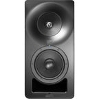 Kali Audio SM-5 active nearfield studio monitors shown on a desk with audio cables and a sound mixing setup.