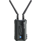 Hollyland Pyro H wireless video receiver connected to camera, displaying live video feed on screen, part of Hollyland wireless video system.
