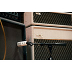 Universal Audio SD-7 dynamic microphone shown with black grille and robust body, ideal for professional audio recording.
