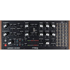 Moog Labyrinth synthesizer with knobs and patch points, featuring a sleek black design and vintage-inspired controls.