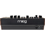 Moog Labyrinth synthesizer with multiple knobs and patch points, featuring a sleek black design and vintage-inspired control layout.