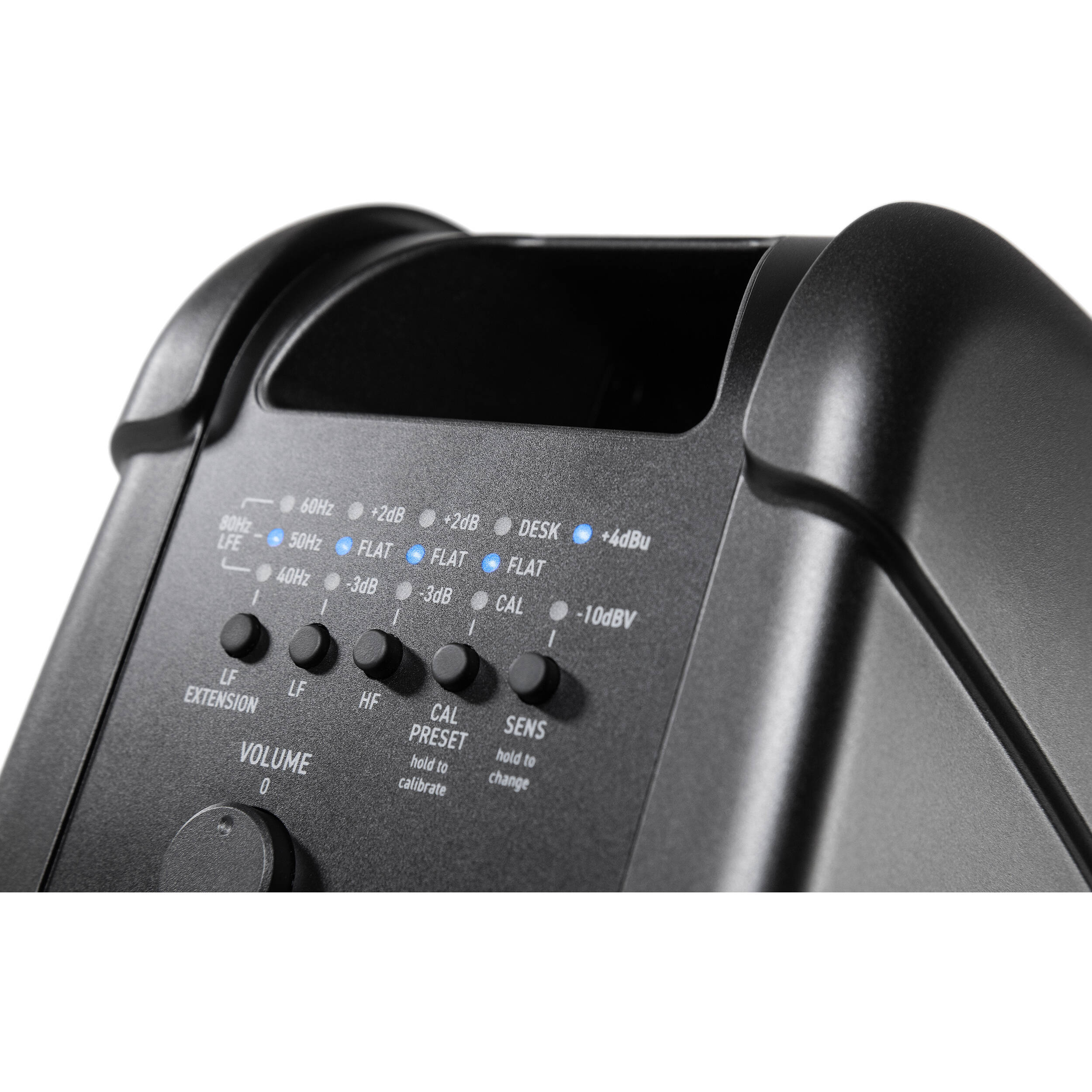 IK Multimedia iLoud MTM MK2 active nearfield monitors on a desk with audio equipment, showcasing their compact design and speaker drivers.