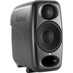 IK Multimedia iLoud Micro Monitor Pro active nearfield monitors on a desk, showing compact speakers with control knobs.