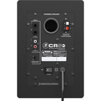 Mackie CR5BT desktop speakers with black finish and control knobs on the front, designed for high-quality audio.