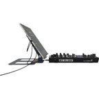 Reloop Stand Hub Pro laptop stand with adjustable arms and ventilation, designed for ergonomic workspace setup.