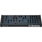Oberheim TEO-5 desktop synthesizer with keyboard and control panel, compact design, and various knobs and switches.
