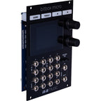 Close-up of the 1010music Bitbox Micro semi-modular synthesizer with colorful knobs and buttons on a black panel.