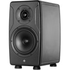IK Multimedia iLoud Precision 6 MK2 active nearfield monitor speakers shown in a studio setting with a sleek black finish.