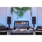 IK Multimedia iLoud Precision 6 MK2 active nearfield monitor showing front view with speaker grille and control panel.