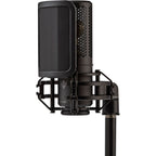 Shure KSM32C/SM condenser studio microphone kit with microphone, shock mount, and cable for professional recording.