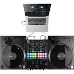Reloop RP-5000 MK4 DJ turntable with professional tonearm and platter, used for DJ mixing and scratching.