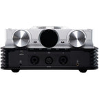 iFi Audio iDSD Phantom headphone amplifier and DAC with digital and analog inputs, compact black audio device on a desk