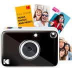 Kodak Printomatic+ instant compact camera with black body and lens, ready to print colorful photos instantly.
