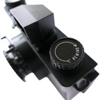 Ilford Pixie 35-II compact instant camera with black body and lens, showcasing its small, lightweight design for easy photography.