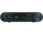 Austrian Audio Full Score One headphone amplifier and DAC with sleek design and control knobs visible on the front panel.
