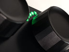 Close-up of Intech Studio TEK2 Series 3 MIDI controller with knobs, buttons, and grid interface for music production.