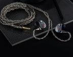 Astell&Kern XIO wired in-ear headphones with sleek black design and inline remote for high-quality audio listening.
