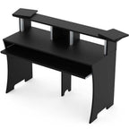 Glorious Studio Workbench, a sturdy black office desk with a spacious surface and modern design for creative workspaces.