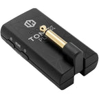 IK Multimedia Tonex plug-in interface showing digital audio processing controls and spectrum display.