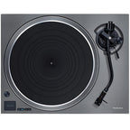 Technics SL-1500CS turntable with wooden plinth and tonearm, showcasing the sleek design and control features.