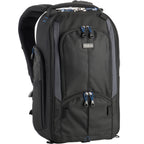 Think Tank StreetWalker V2.0 video equipment bag with multiple compartments and padded straps for carrying camera gear.