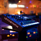 ASM Leviasynth Desktop synthesizer with tactile knobs, colorful controls, and compact design for music production.