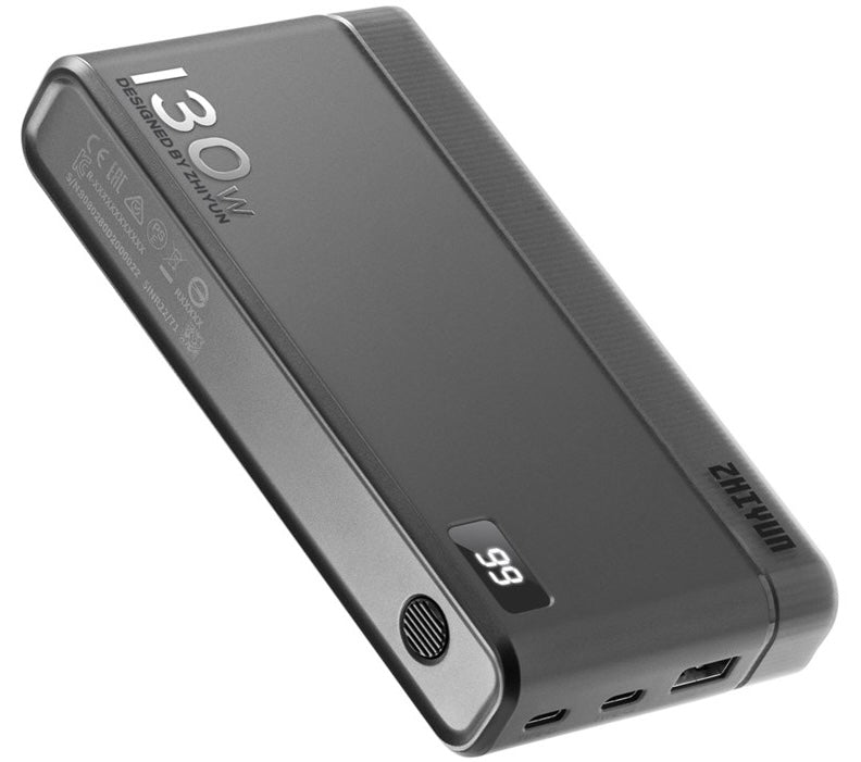 Zhiyun Molus Power Bank 130W portable charger with multiple USB ports and digital display showing battery level.