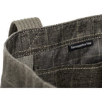 Think Tank Retrospective Tote shown with padded interior and exterior pockets, designed for carrying video equipment and accessories.