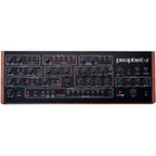 Sequential Prophet-5 desktop synthesizer with keyboard, featuring vintage-style control panel and silver finish.