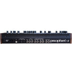 Sequential Prophet-5 Desktop synthesizer shown from the back, featuring control knobs, input/output ports, and sleek design.