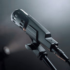 Warm Audio Retro 64 dynamic microphone in matte black finish, featuring vintage design and sturdy build for professional audio recording.