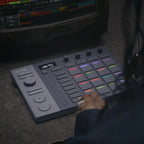 AlphaTheta SLAB MIDI controller with multiple knobs and pads, designed for music production and live performances.