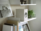 KEF Q1 Meta passive bookshelf speakers shown in black with sleek design and compact size, ideal for home audio systems.