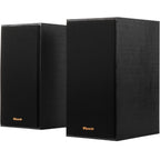 Klipsch R-41PM active bookshelf speakers with wood finish and control knobs, designed for high-quality audio playback.