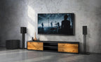 Black Klipsch R-40PM wireless speakers shown with sleek design and front-facing speaker grille, ideal for home audio.
