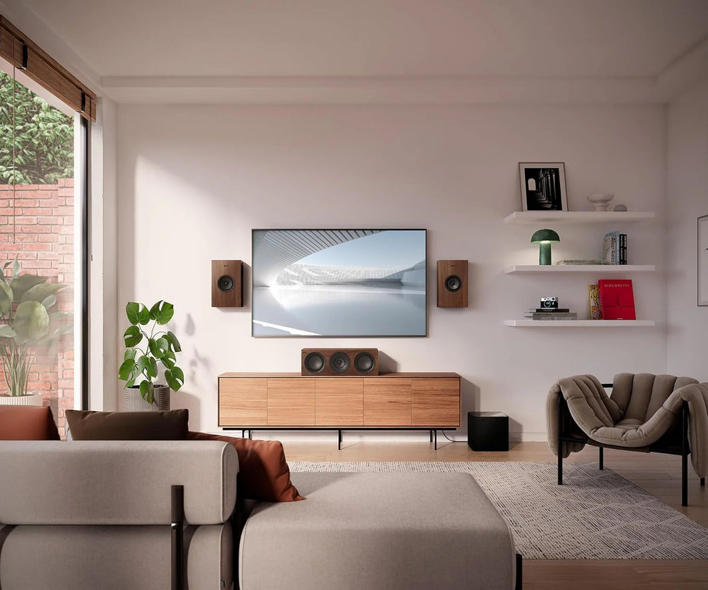 KEF Q6 Meta center speaker with sleek black finish, designed for high-quality home theater audio.
