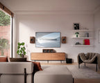 KEF Q6 Meta center speaker with sleek black finish, designed for high-quality home theater audio.
