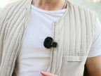 Rode Wireless Micro Lightning wireless microphone system in black, compact design for high-quality audio recording.